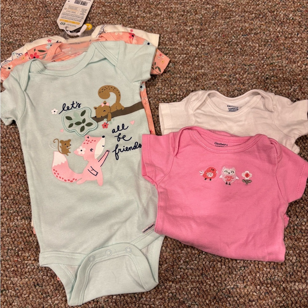 Carter's Girls Onesies 3-6 month size. 5 total; 3 NWT